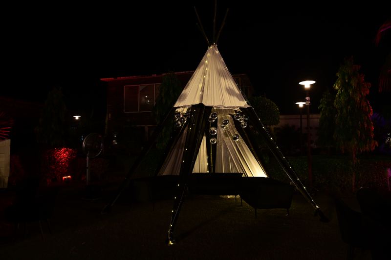 Rustic teepee tent at outdoor event in Greater Noida