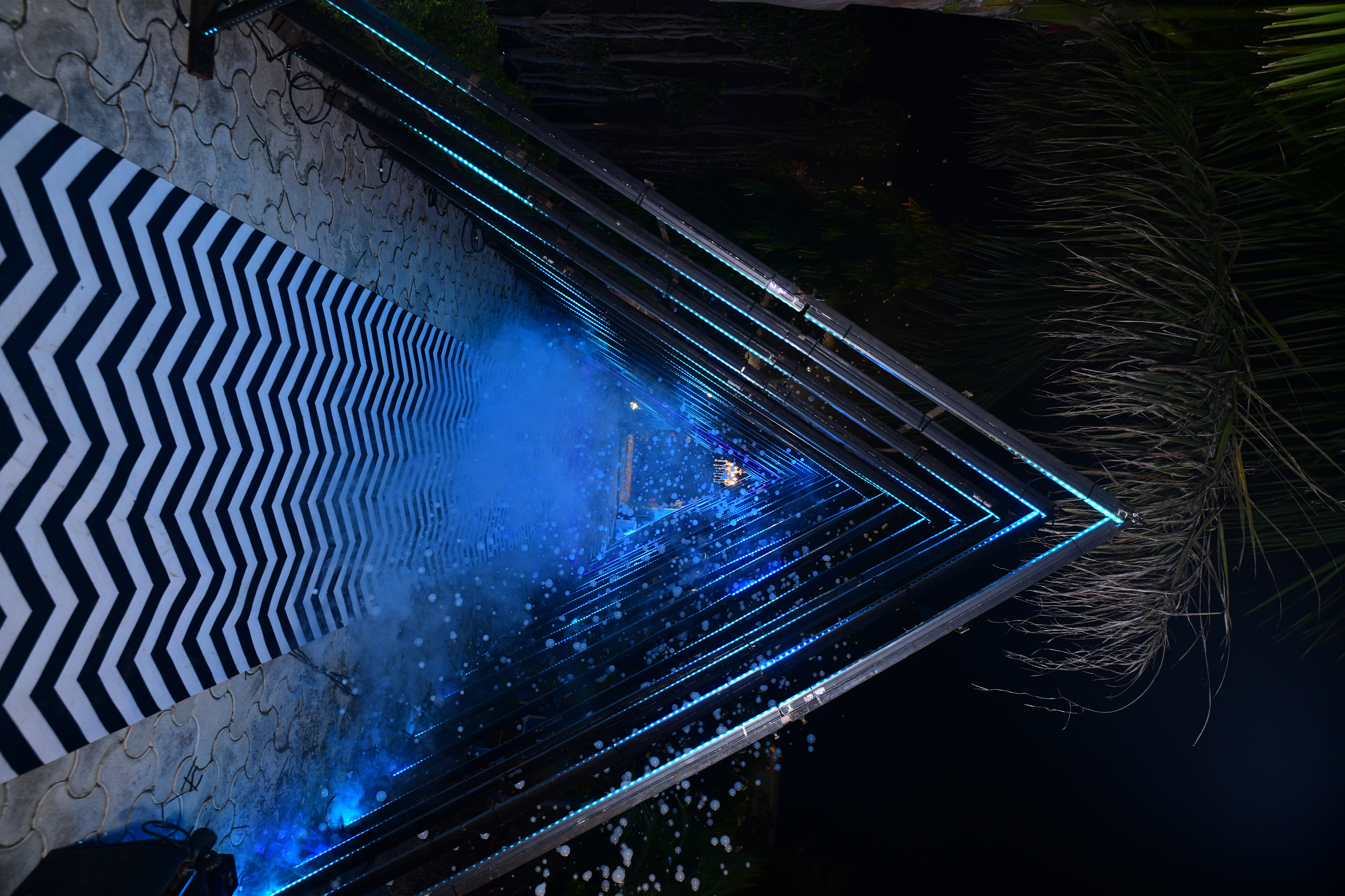 Blue-lit event archway in Greater Noida